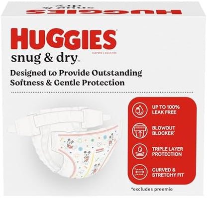 Huggies Size 1 Diapers, Snug &amp; Dry Newborn Diapers, Size 1 (8-14 lbs), 128 Count, Packaging May Vary