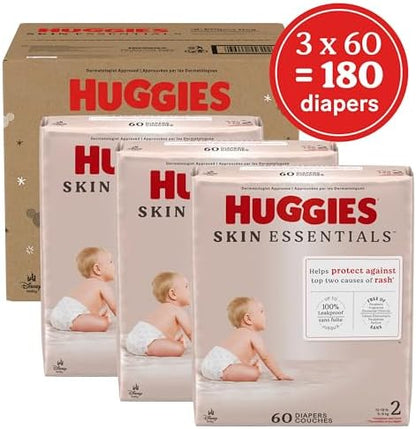 Huggies Size 2 Diapers, Skin Essentials Baby Diapers, Size 2 (12-18 lbs), 74 Count, Packaging May Vary