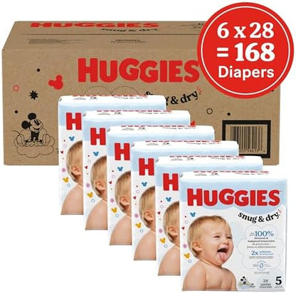 Huggies Size 1 Diapers, Snug &amp; Dry Newborn Diapers, Size 1 (8-14 lbs), 128 Count, Packaging May Vary