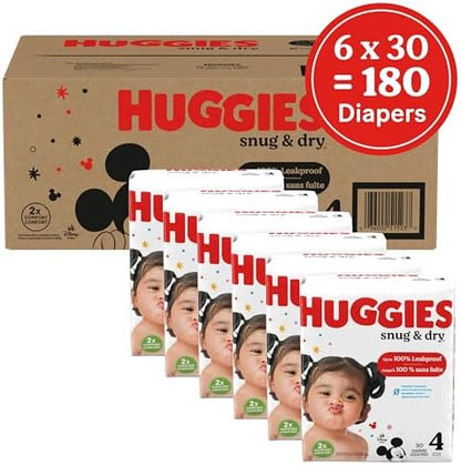 Huggies Size 1 Diapers, Snug &amp; Dry Newborn Diapers, Size 1 (8-14 lbs), 128 Count, Packaging May Vary