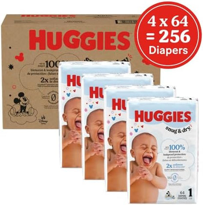 Huggies Size 1 Diapers, Snug &amp; Dry Newborn Diapers, Size 1 (8-14 lbs), 128 Count, Packaging May Vary